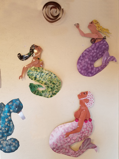 A Group of Mermaids and their Sea Horse Friend